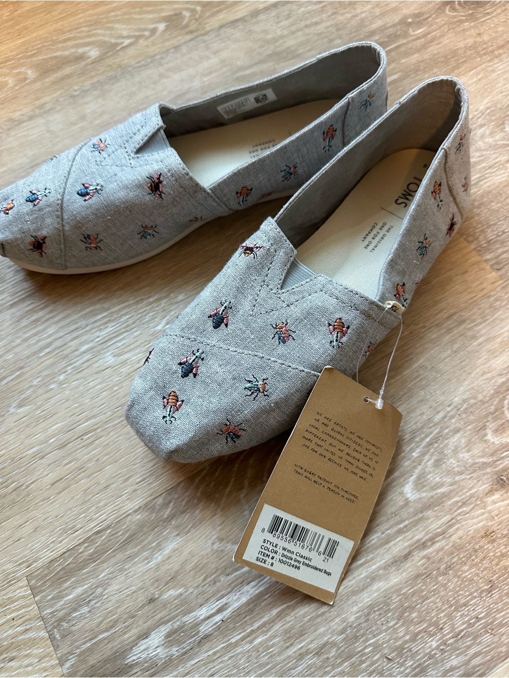 TOMS Light Grey Linen Slip-On Flats with Embroidered Bugs